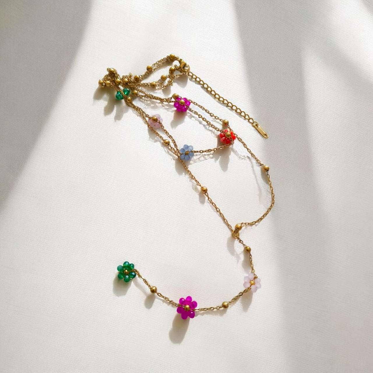 Collier bohème double chaîne fleurs acier or 18K