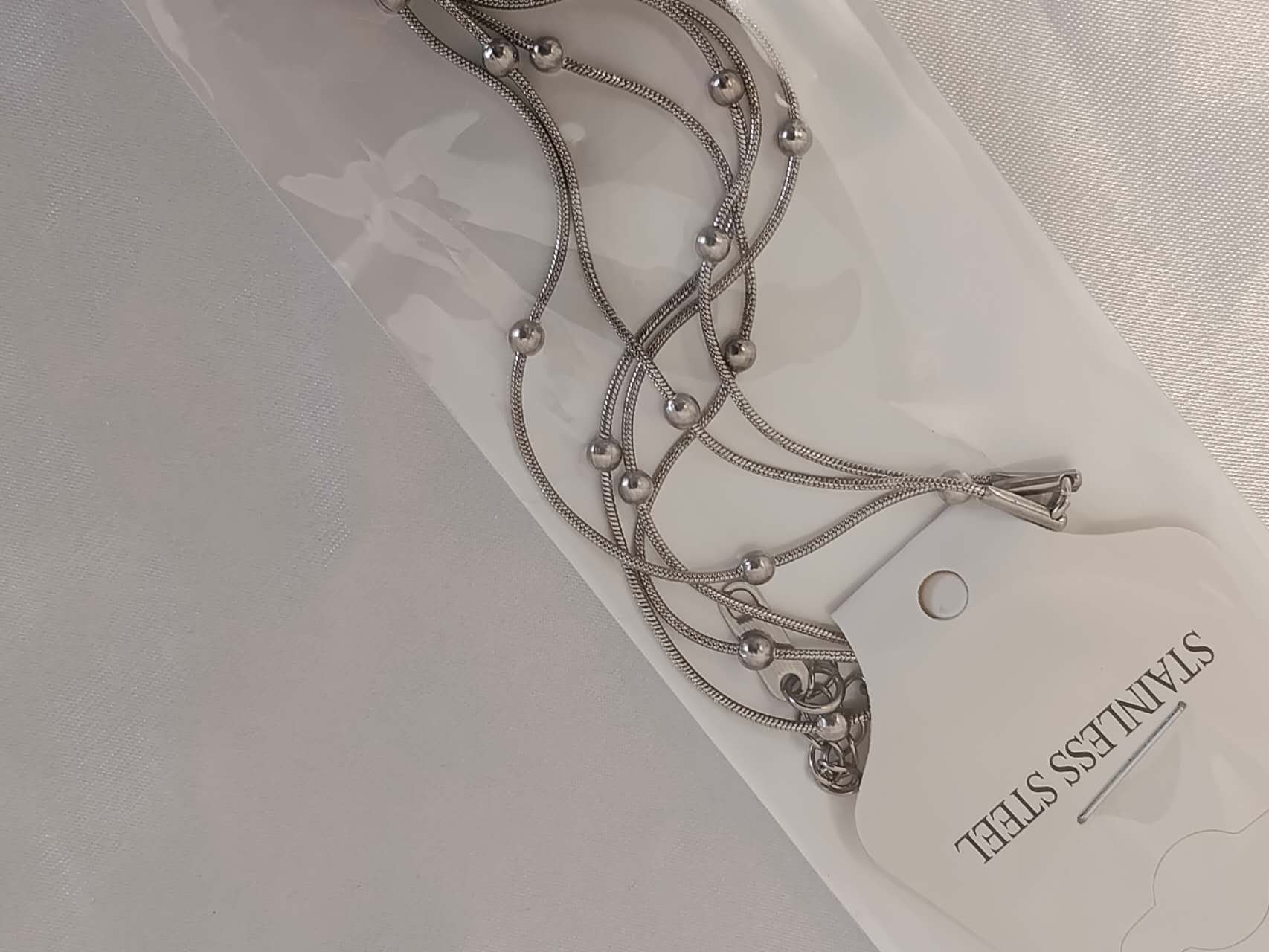 Collier triple chaîne à petites perles, acier, Or 18K