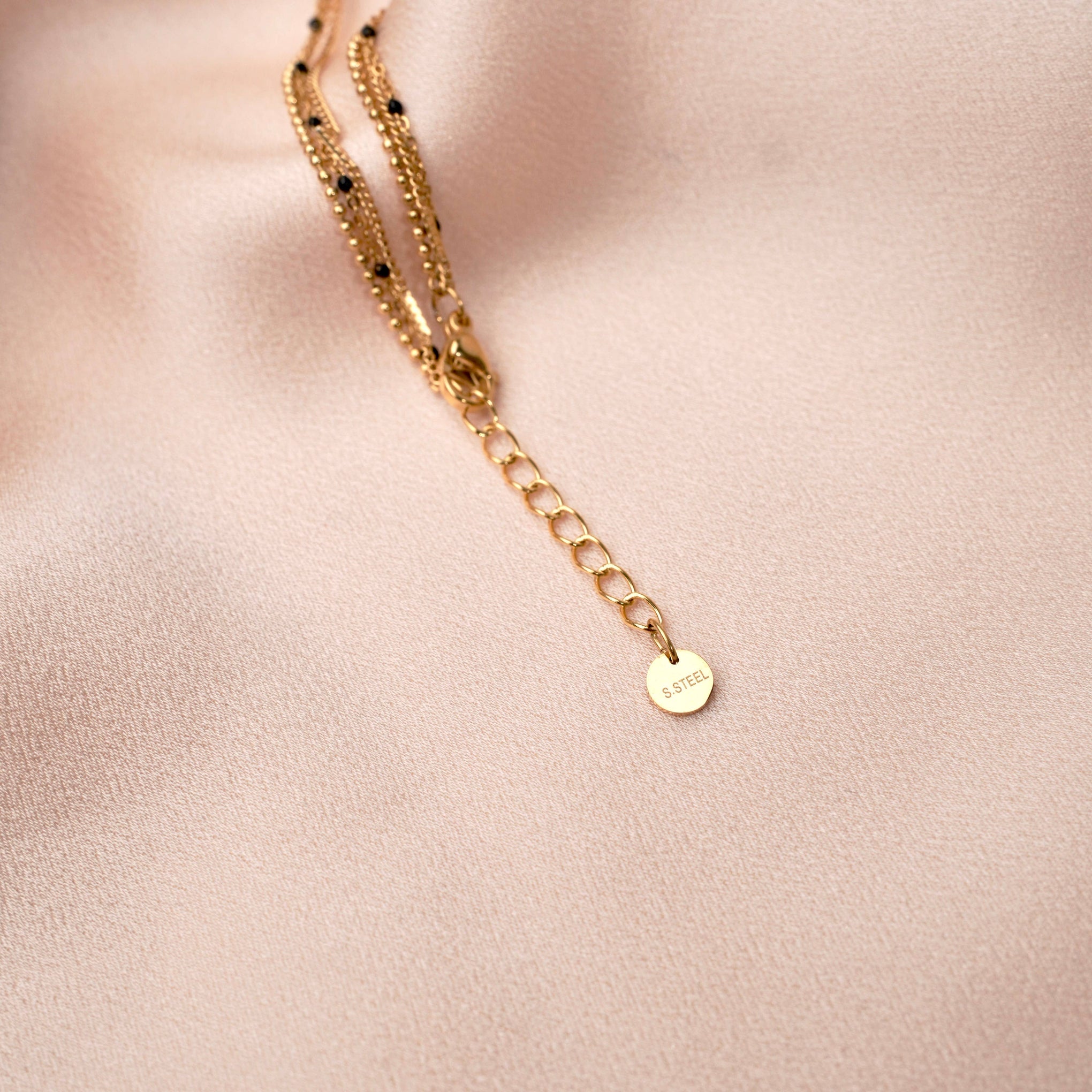 Bracelet triple acier inoxydable points blancs