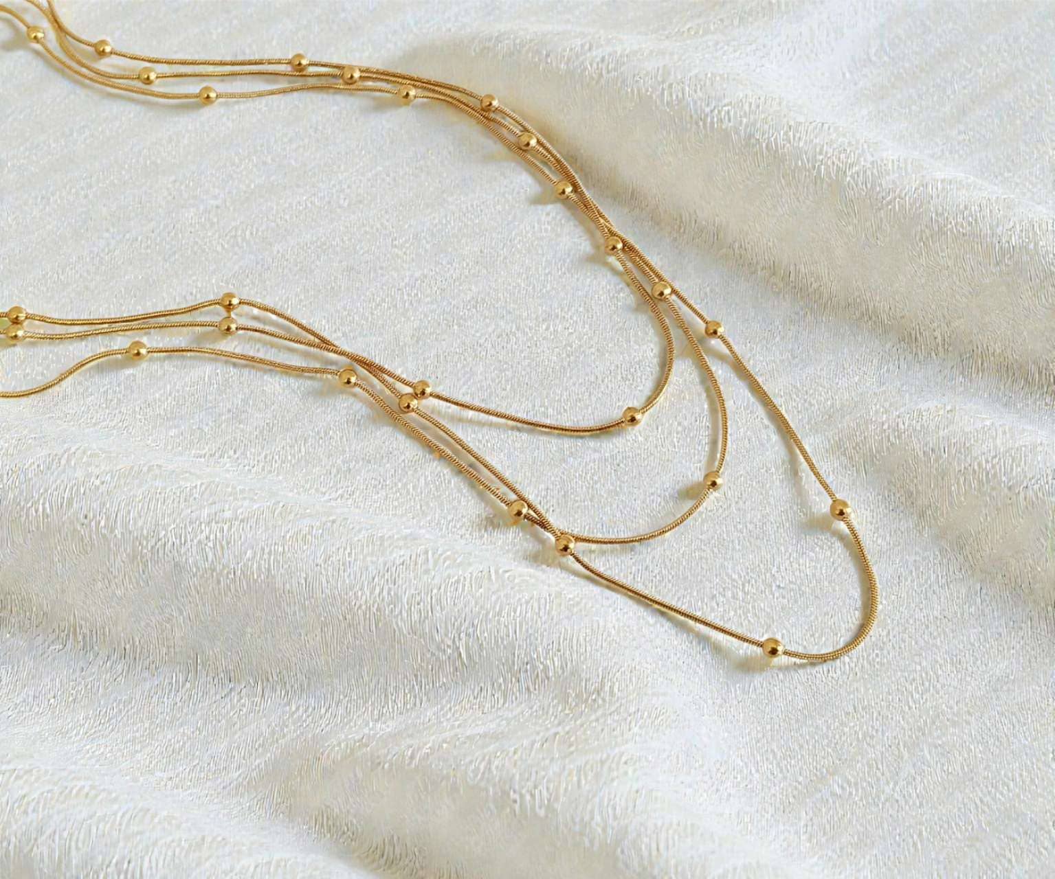 Collier triple chaîne à petites perles, acier, Or 18K